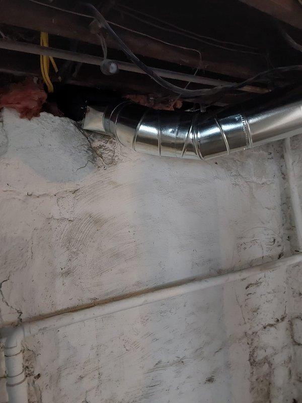 Successfully repaired a 7" ductwork run that had become disconnected in the basement utility area. Properly secured the metal duct sections with connecting bands at the joints, ensuring proper airflow through the system and restoring full functionality to the HVAC infrastructure.