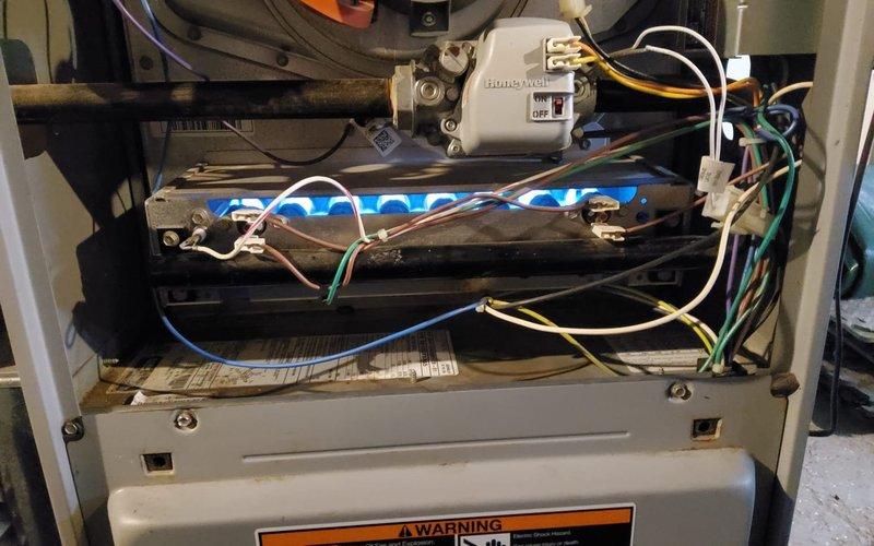 Responded to no heat call for MVP customer. Inspection revealed signs of rust on motor assembly components and complex wiring issues within the furnace control system. Performed necessary repairs to restore proper heating function.