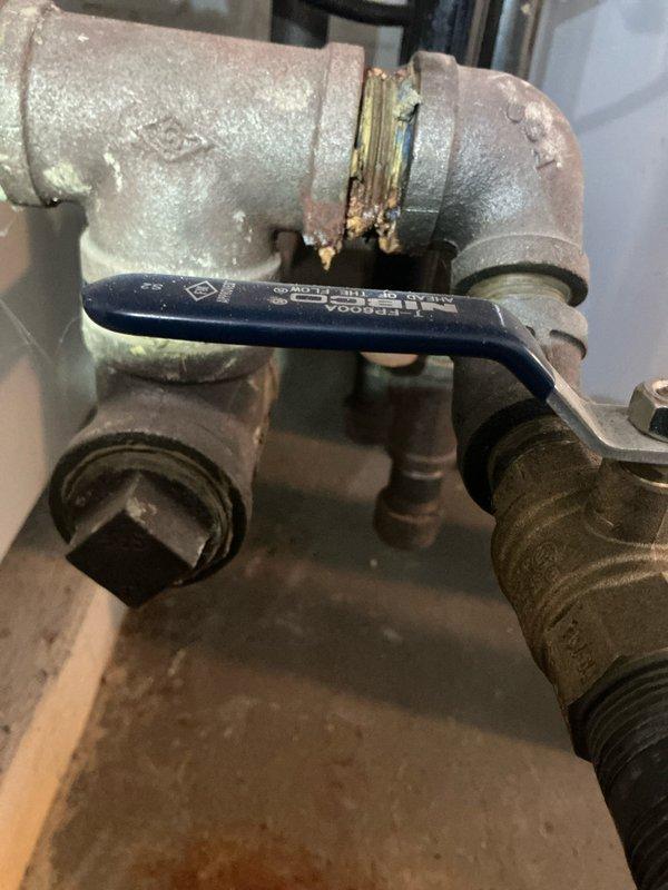 Performed scheduled heating tune-up on steam boiler #8-12. Inspected burner assembly and confirmed proper flame pattern during operation. Noted corrosion at pipe junction requiring monitoring; all valves and connections remain functional. System operating within normal parameters.