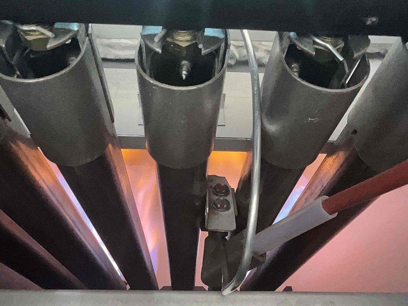 Performed scheduled heating tune-up on steam boiler #8-12. Inspected burner assembly and confirmed proper flame pattern during operation. Noted corrosion at pipe junction requiring monitoring; all valves and connections remain functional. System operating within normal parameters.