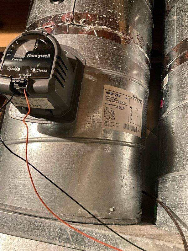 Successfully installed new Bryant furnace on existing 8" blocks for the 2nd floor system, reusing the 2" PVC venting, filter, and existing Honeywell zone damper control system. Added a humidifier to the setup while maintaining compatibility with existing thermostats. All components were properly connected with organized piping and appropriate electrical connections.