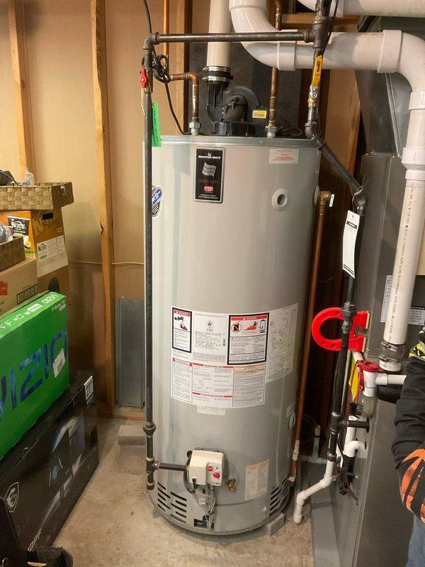 Responded to service call regarding 14-year-old water heater replacement. Upon inspection of the existing 75-gallon unit, recommended downsizing to a 50-gallon Bradford White model as requested by customer. Completed installation of new water heater, ensuring proper connections to existing copper and PVC piping system with appropriate valves. Final inspection confirmed system integrity with no leaks.