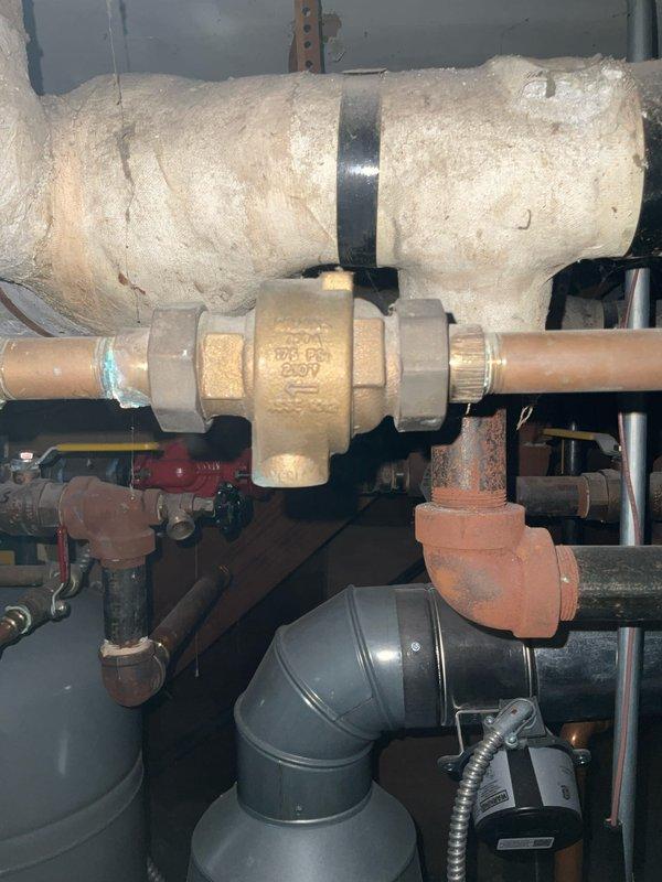 Completed scheduled heating system maintenance service. Performed combustion analysis on boiler system with readings of CO: 0, CO2: 7.9%, excess air: 50.3%, and system loss: 17.6%. Inspected pressure regulator valve and associated plumbing components for proper operation and signs of wear.