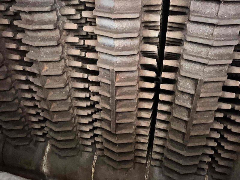 Performed scheduled maintenance on HP Commercial Steam Boiler. Inspected heat exchanger tubes and burner assembly, confirming proper operation with even flame distribution. Checked boiler stack arrangement and verified structural integrity of all components.