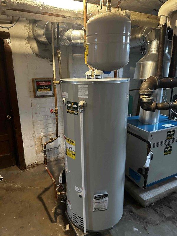 Successfully completed replacement of 75-gallon water heater in basement mechanical room. Installed new ICON System control panel with temperature adjustment capabilities. All copper pipes and connections properly fitted with expansion tank integration.