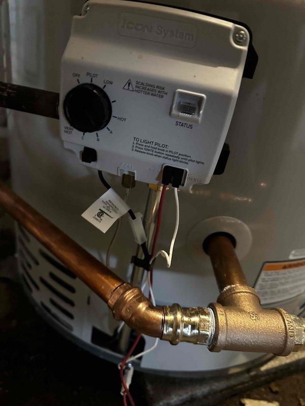 Successfully completed replacement of 75-gallon water heater in basement mechanical room. Installed new ICON System control panel with temperature adjustment capabilities. All copper pipes and connections properly fitted with expansion tank integration.