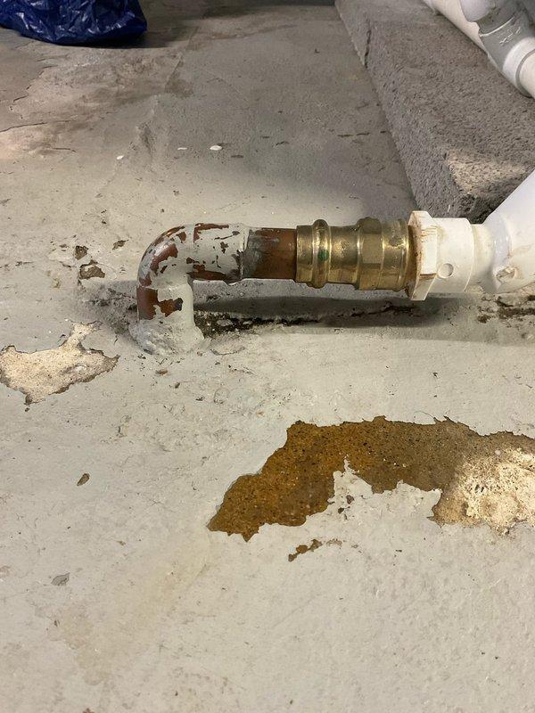 Responded to a service call regarding water leakage from a broken humidifier discharge pipe. Upon inspection, identified corrosion at the brass coupling where the PVC pipe connects to the copper line. Repaired the damaged connection and verified proper water flow with no further leakage from the system.