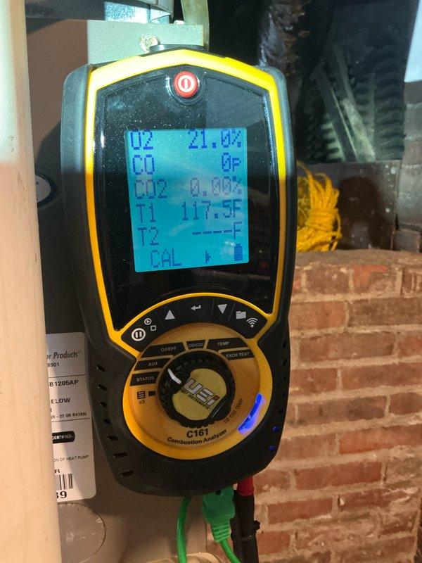 Performed scheduled heating maintenance on two systems. Conducted combustion analysis using UEi C161 analyzer, confirming proper oxygen levels (21.0%), zero carbon monoxide, and operational temperature (117.5°F). Inspected evaporator coil condition, noting standard fin alignment with no visible damage or excessive buildup.
