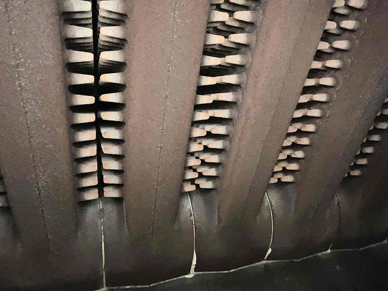 Performed scheduled heating maintenance on two systems. Conducted combustion analysis using UEi C161 analyzer, confirming proper oxygen levels (21.0%), zero carbon monoxide, and operational temperature (117.5°F). Inspected evaporator coil condition, noting standard fin alignment with no visible damage or excessive buildup.