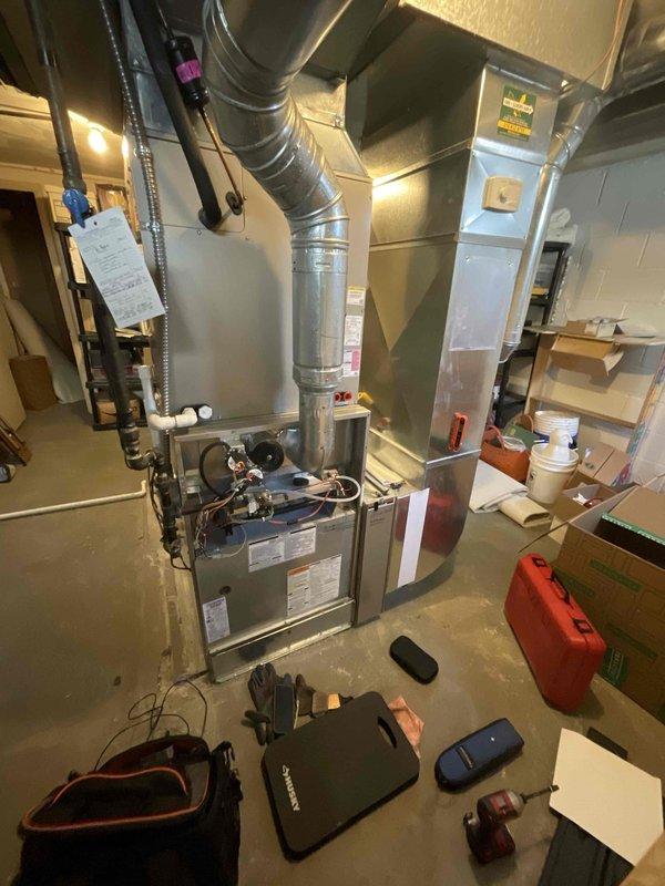 Performed scheduled Home Plan Heating Tune Up on residential furnace system. Conducted comprehensive diagnostic testing using digital thermometer, recording temperature readings of 50.5°F. Inspected ductwork, control panels and connection points to ensure proper functionality of the heating system.