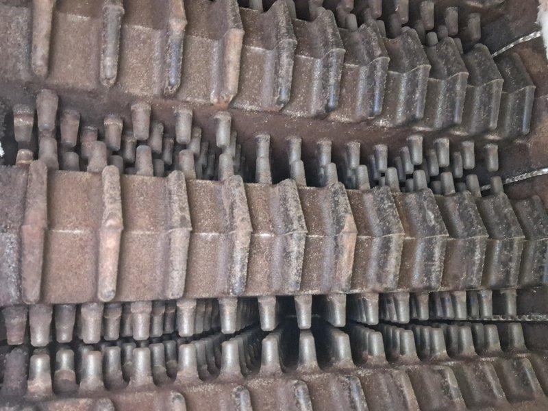 Performed scheduled maintenance on steam boiler system per national maintenance program. Inspected heat exchanger segments for proper alignment and condition. Documented current state of refractory tiles showing normal wear pattern with no immediate concerns requiring replacement.