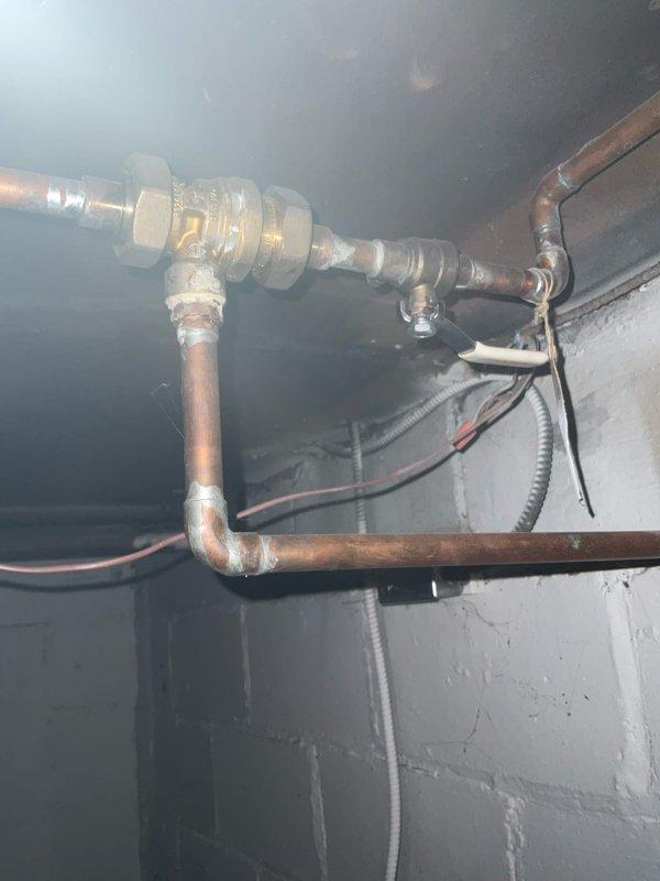Completed annual maintenance service on Lennox gas steam boiler. Inspected copper supply lines, valves, and connections for proper operation and signs of oxidation. Examined furnace ductwork, associated plumbing components, and verified proper system function as part of scheduled tune-up service.