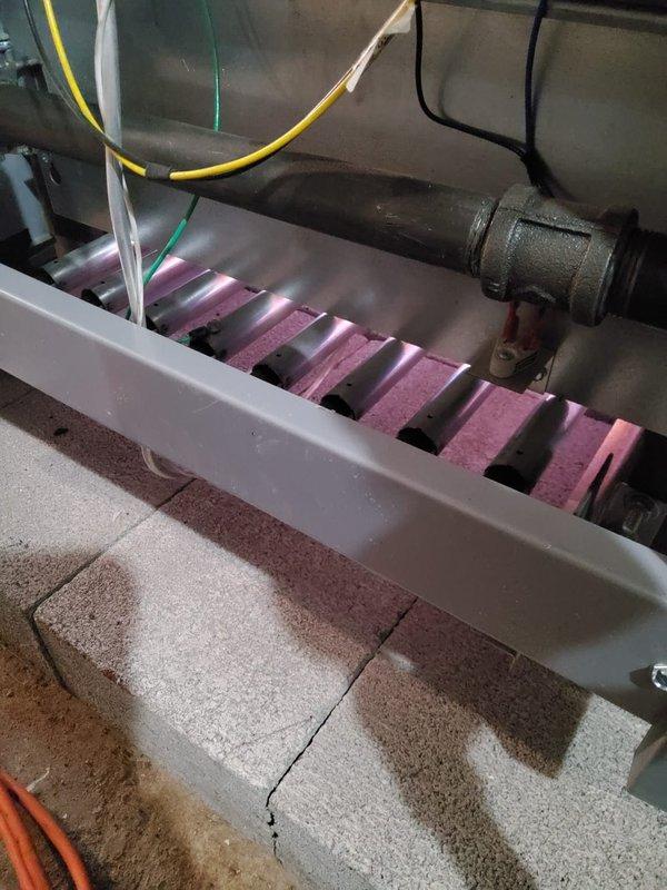 Performed scheduled boiler tuneup and skimming service. Inspected internal components including pipes, fittings and insulation material. Noted concrete floor cracking in mechanical room but equipment mounting remains secure.