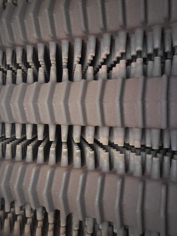 Performed scheduled boiler tuneup and skimming service. Inspected internal components including pipes, fittings and insulation material. Noted concrete floor cracking in mechanical room but equipment mounting remains secure.