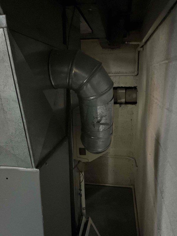 Conducted comprehensive inspection of aging HVAC system in basement utility room, including Amana furnace unit and connected air handler. Documented existing equipment condition, ductwork configuration, and ventilation components to prepare replacement estimate. Evaluation focused on galvanized metal ductwork connections, PVC exhaust piping, and overall system integration for proper replacement specification.
