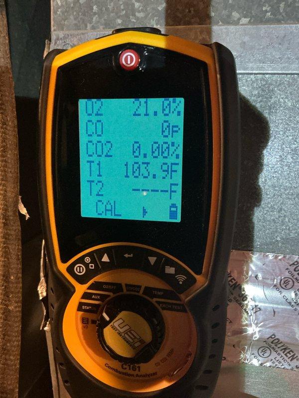 Conducted routine furnace tune-up on 2-year-old system. Replaced batteries in thermostat and installed new Aprilaire 410 filter (16x25x4). Performed combustion analysis with C151 analyzer confirming proper oxygen levels (21.0%) and zero carbon monoxide, verified heat exchanger operation with temperature readings at 103.9°F.