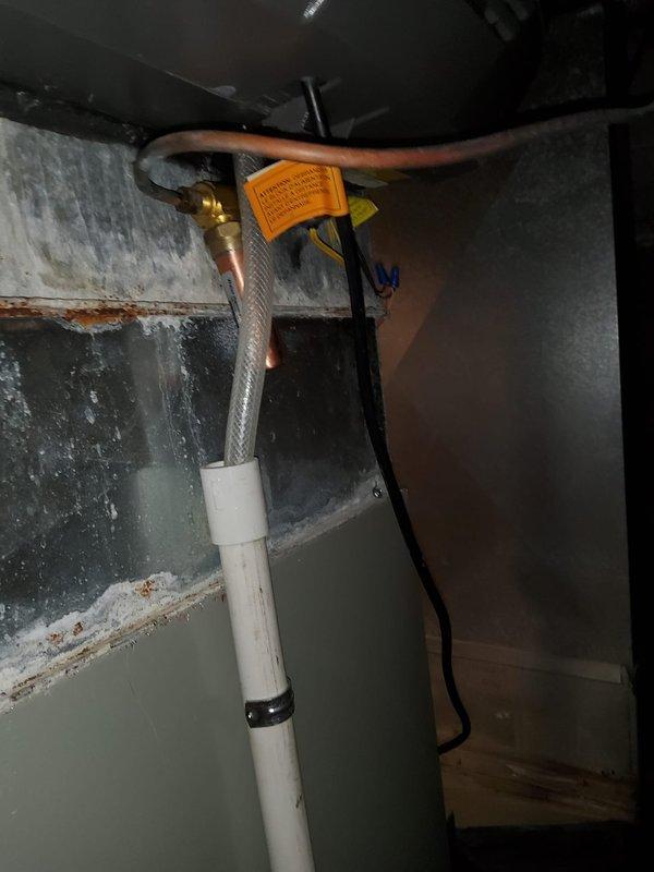 Successfully installed a water hammer shock arrestor and upgraded the expansion tank to a larger size to improve system performance and reduce water pressure fluctuations. All necessary parts were obtained from shop inventory prior to 8am arrival time, and installation was completed with proper connections to the existing Bradford White water heater system.