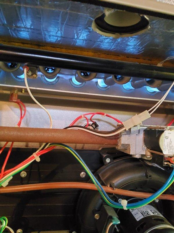 Performed routine furnace tune-up, inspecting gas burner assembly which showed proper blue flame ignition and combustion. Examined heat exchanger, blower motor, and electrical connections which were all functioning within specifications. System is operating efficiently with no issues detected.