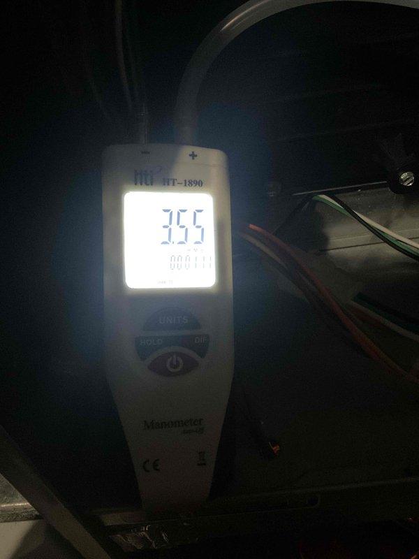 Performed scheduled maintenance on a 4-year-old furnace as part of the Home Plan Heating Tune Up service. Conducted gas pressure testing using a digital manometer (HT-1890), recording readings of 35.5 and 15.3 to verify proper system operation. System is functioning within manufacturer specifications after service completion.