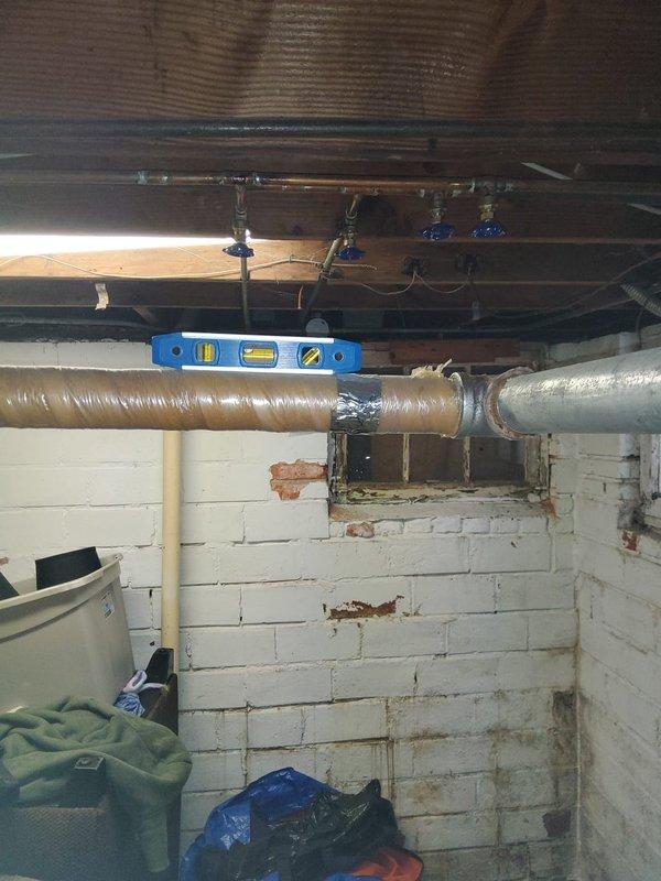 Responded to service call for radiator leak on 3rd floor and pipe banging. Inspected plumbing system in utility area, using level to verify proper pipe alignment. Found and repaired leaking radiator connection and adjusted system pressure to eliminate water hammer noise in pipes.