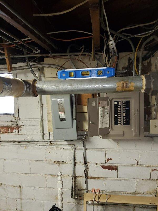 Responded to service call for radiator leak on 3rd floor and pipe banging. Inspected plumbing system in utility area, using level to verify proper pipe alignment. Found and repaired leaking radiator connection and adjusted system pressure to eliminate water hammer noise in pipes.