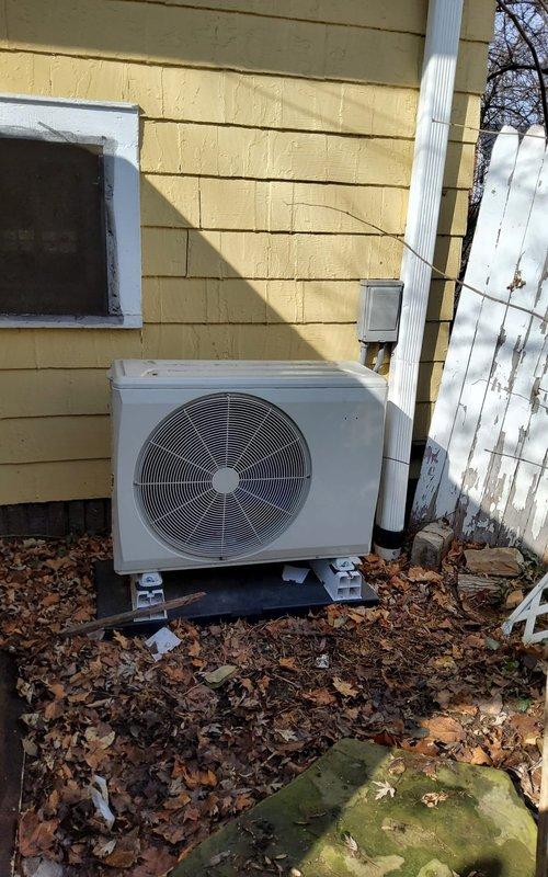 Responded to service call for heat pump refrigerant leak. Performed diagnostic testing using CPS VG200 Digital Vacuometer, achieving 26.0 in Hg vacuum level, confirming system integrity after repairs. Successfully sealed leak and recharged system to manufacturer specifications, restoring proper operation of the outdoor condenser unit.