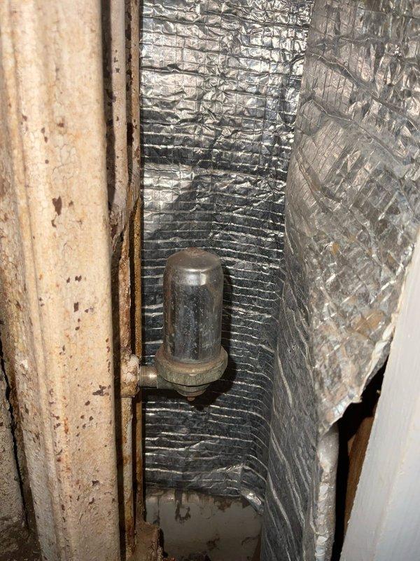 Conducted inspection of customer's bathroom and HVAC/plumbing systems. Evaluated two sink fixtures and toilet for potential replacement, noting worn toilet seat hinges and dated appearance. Documented moisture indicator on HVAC component showing signs of condensation and damaged insulation requiring attention.
