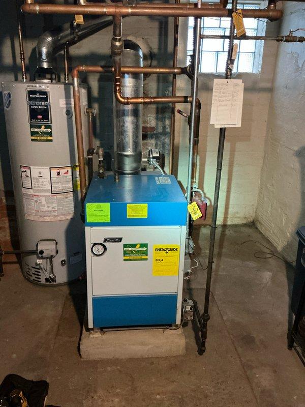 Performed annual maintenance inspection on natural gas boiler system. Inspected heat exchanger, checked pressure gauge readings, and examined all copper piping connections for proper operation. System was cleaned and verified to be functioning within normal parameters.