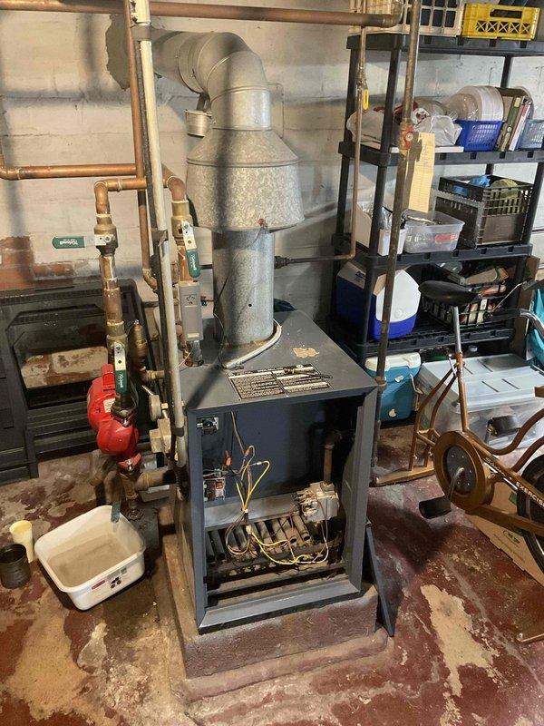 Performed comprehensive maintenance service on 20+ year old boiler system. Inspected electrical connections, heat exchanger, and venting system for proper operation. Noted aging equipment with standard wear; system is operational but customer should consider replacement options in the near future due to equipment age.