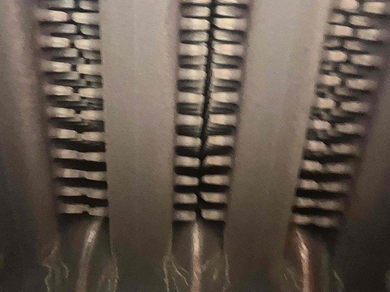 Performed scheduled maintenance on steam boiler system under Home Plan Plumbing service agreement. Inspected heat exchanger coils and burner assembly, confirming proper flame pattern with characteristic blue-to-orange combustion indicating efficient operation. Visual examination confirmed heat transfer components are in satisfactory condition with no signs of deterioration.