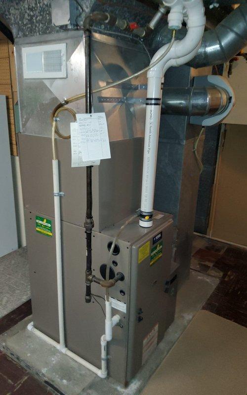 Performed inspection on 13-year-old York furnace after buyer's inspection noted gas odor near regulator in upper cabinet. Located and repaired significant corrosion and rust at gas line connection point. System now operating safely with no gas leaks detected.