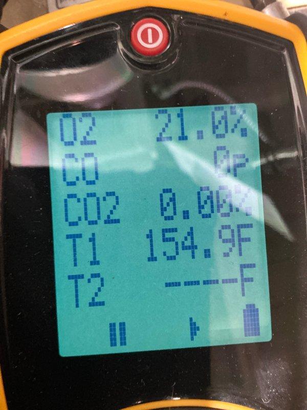 Performed routine maintenance on 10+ year old hydronic boiler. Conducted combustion analysis with digital analyzer showing O2 levels at 21.0% initially and CO2 at 7.1% post-adjustment, with flue gas temperature reaching 409.1°F. System now operating within manufacturer specifications.