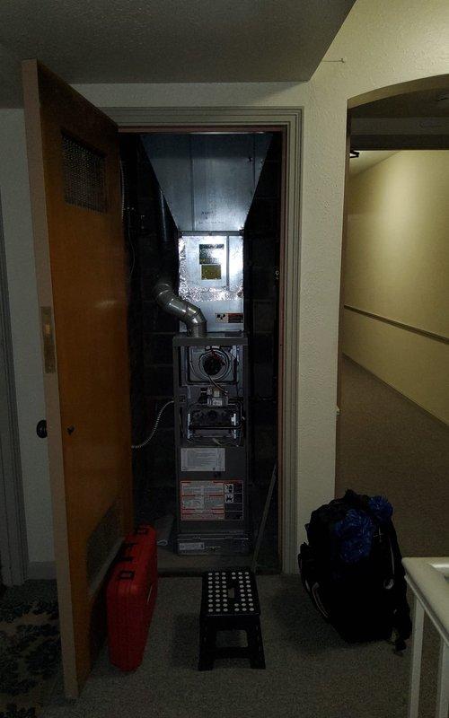 Performed standard maintenance on 13-year-old MVP gas furnace. Inspected gas valve assembly, verified proper flame characteristics with healthy blue flames indicating good combustion, and ensured all wiring connections were secure and properly functioning. System is operating normally with no issues detected.