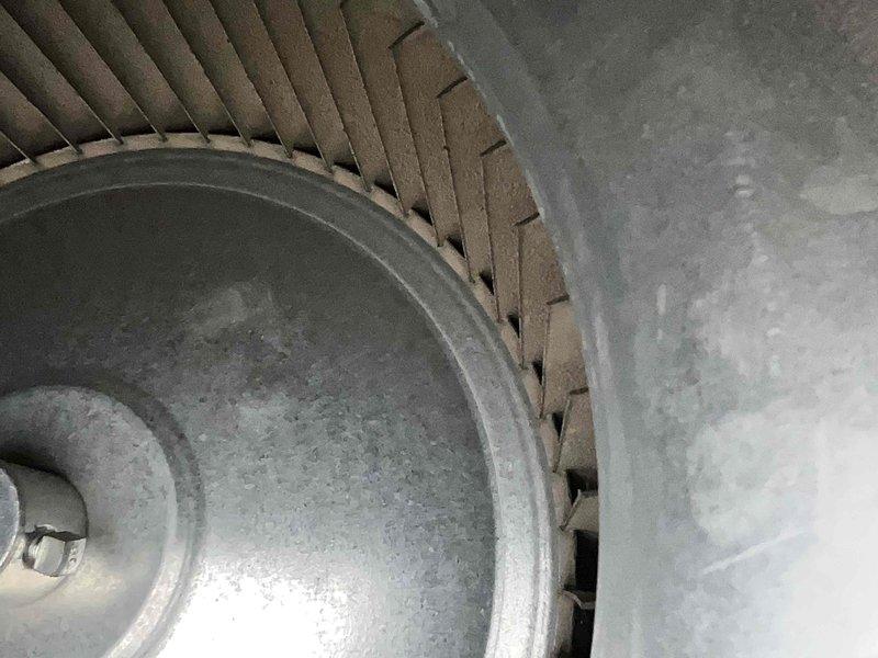 Performed comprehensive heating system maintenance check including combustion analysis with readings of 21.0% O2, 0.0% CO2, and system temperature of 133.9°F. Inspected blower wheel assembly for proper operation and cleanliness, noting minimal dust accumulation on fan blades. Renewed TechFurn maintenance agreement for continued system coverage.