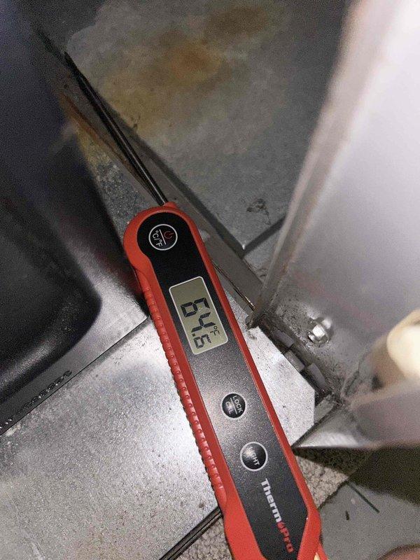 Performed scheduled heating system maintenance. Conducted combustion analysis with UEi C161 analyzer showing normal CO2 (7.4%) and O2 (8.0%) levels at 104.5°F. Temperature probe readings (57.6°) confirmed system operating within parameters.