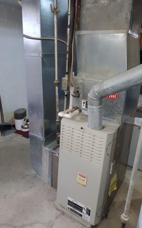 Performed scheduled maintenance on 25+ year old gas furnace. Inspected blower wheel assembly and found it in normal operating condition with minimal dust accumulation. Completed comprehensive tune-up service ensuring proper system functionality for continued reliable operation.