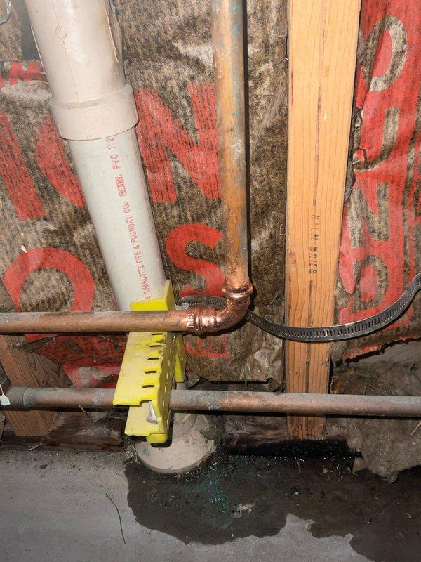 Responded to main water line leak emergency requiring city water shut-off. Installed new copper pipe fittings at the source of the leak, replacing damaged section with proper elbow joint and securing to framing with pipe support brackets. Confirmed repair was successful with no moisture ingress after service completion.