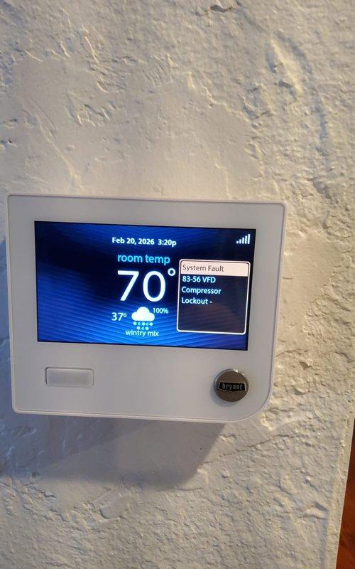 Responded to service call for a Bryant Evolution heat pump system experiencing fault code 83 (VFD Compressor Lockout). Diagnostic review of the thermostat confirmed multiple system events including error 83-56 VFD Compressor Lockout and 83-16 VFD Compressor Fault on the first floor unit. Resolved compressor lockout issue on the 4-year-old heat pump system.