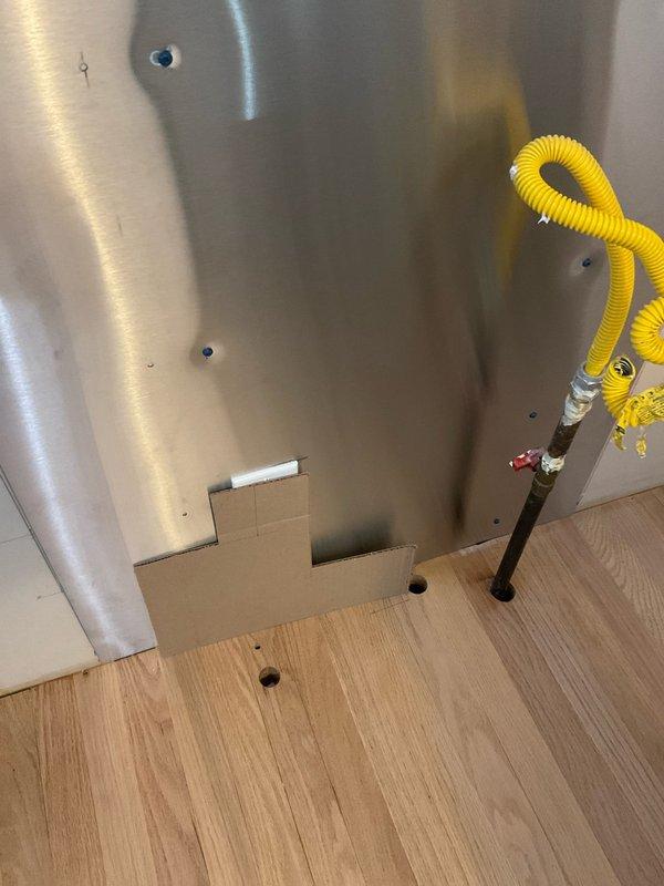 Relocated gas line approximately 5 inches to accommodate new stove installation. Connected stove to gas supply using code-compliant flexible connector. Performed pressure test to verify system integrity and ensure no leaks at all connection points.