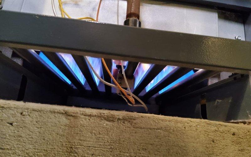 Completed annual inspection on residential steam boiler system. Examined burner assembly with blue flame operation, checked all copper piping connections, and ensured proper pressure readings. Customer renewed maintenance plan with payment collected onsite.