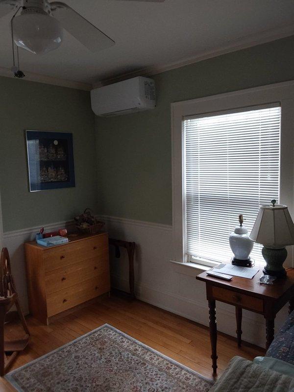 Successfully installed a 5-zone ductless mini-split system with strategic placement of indoor units throughout the residence. System includes 12K BTU wall-mounted units in the 3rd floor and kitchen (above door), 9K BTU wall-mounted units in the master and front bedrooms, and a 12K BTU floor console in the office positioned to condition the living room. Condenser was placed at the rear of the property as specified, with all units properly mounted, connected and tested for operation.