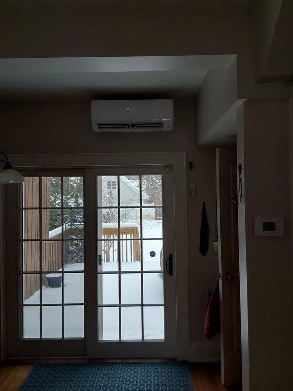 Successfully installed a 5-zone ductless mini-split system with strategic placement of indoor units throughout the residence. System includes 12K BTU wall-mounted units in the 3rd floor and kitchen (above door), 9K BTU wall-mounted units in the master and front bedrooms, and a 12K BTU floor console in the office positioned to condition the living room. Condenser was placed at the rear of the property as specified, with all units properly mounted, connected and tested for operation.
