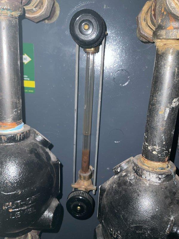Performed scheduled maintenance on two steam boiler units. Conducted combustion analysis with readings showing CO at 26P, CO2 at 9.1%, excess air at 31.1%, and other parameters within acceptable ranges. Inspected sight glass and surrounding plumbing components, noting some corrosion at connection points that should be monitored but are currently functional.