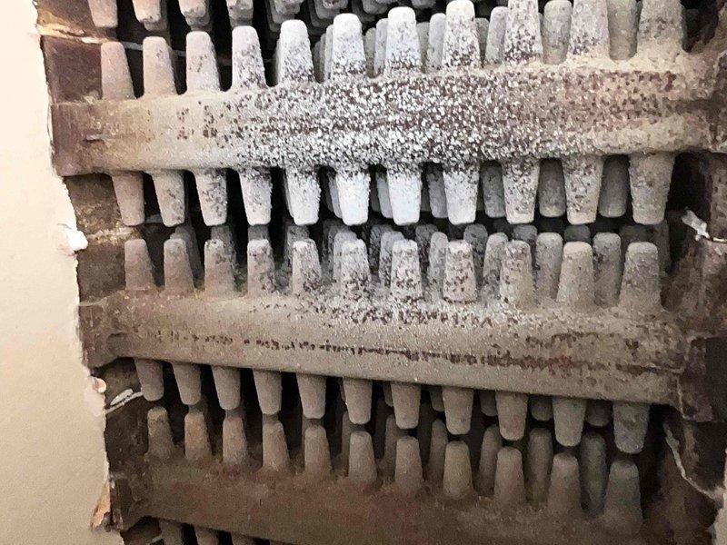 Performed annual furnace tune-up which included inspection of heat exchanger coils that showed significant dust/dirt accumulation requiring cleaning. Combustion analysis performed with digital analyzer confirming proper operation with readings of 21.0% O2, 0 PPM CO, 0.00% CO2, and stack temperature of 107.7°F.