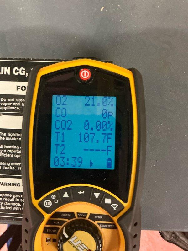 Performed annual furnace tune-up which included inspection of heat exchanger coils that showed significant dust/dirt accumulation requiring cleaning. Combustion analysis performed with digital analyzer confirming proper operation with readings of 21.0% O2, 0 PPM CO, 0.00% CO2, and stack temperature of 107.7°F.