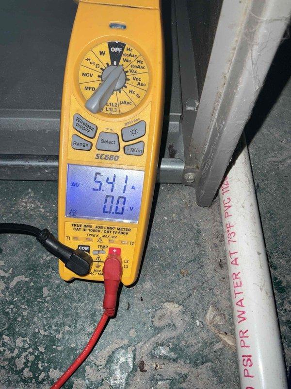 Performed scheduled Home Plan Heating Tune Up on customer's furnace system. Conducted electrical diagnostic testing with multimeter, verifying amperage draw of 5.41A during operation. Inspected furnace components and ductwork connections, confirming proper installation and function of the heating system.