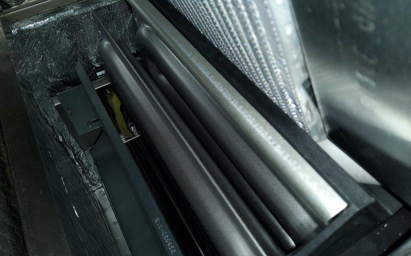 Conducted service callback on furnace unit. Inspected refrigerant lines, cooling coil, and heat exchanger. Examined interior compartment components including piping and electronic housing to resolve previous service issue.