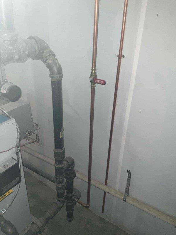 Performed scheduled furnace tune-up service. Inspected boiler system components including sight glass, valves, and copper supply lines. Verified proper operation of Safgard system and checked all plumbing connections in utility area for leaks. System functioning properly with no issues identified.