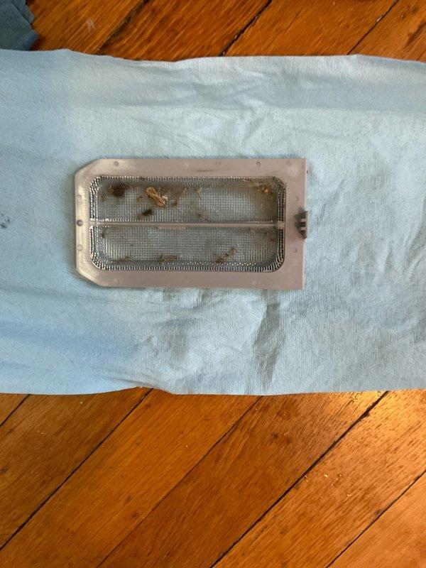 Performed scheduled tankless water heater descaling service. Removed and cleaned filter screen of accumulated debris. Connected flush pump to unit and circulated descaling solution through heat exchanger to remove mineral buildup, restoring optimal performance and efficiency.