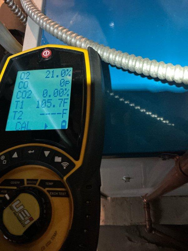 Performed scheduled furnace maintenance on heating system with rescheduled appointment. Conducted combustion analysis with readings of O2 21.8%, CO 0, CO2 0.00%, and temperature at 105.7°F. Confirmed proper burner operation with normal flame pattern and no safety concerns.